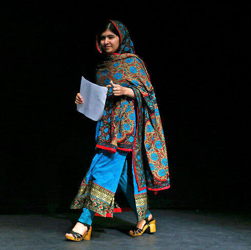 Malala at press conference. "I felt more powerful and more courageous" (Photo: AP)