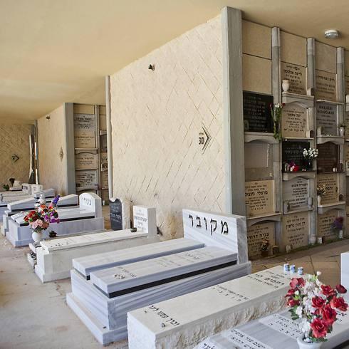 They are registered as Jews in the Ministry of Interior, but the rabbi wouldn't let the man bury his wife in their town. 'She is not Jewish,' he ruled (Archive photo: AP) (צילום: AP) They are registered as Jews in the Ministry of Interior, but the rabbi wouldn't let the man bury his wife in their town. 'She is not Jewish,' he ruled (Archive photo: AP)