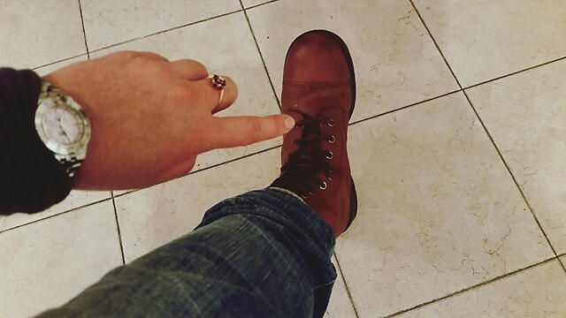 Gill showing off the boots she fought innullnull Gill showing off the boots she fought in