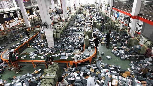 Packages on the assembly line on Singles Day in China. (Photo: Getty Images)