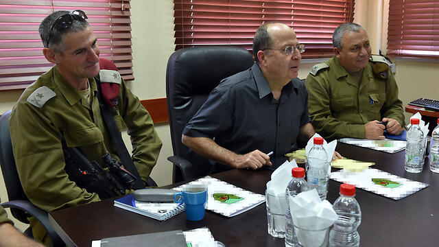 Maj. Gen. Yair Golan, left, with former defense minister Moshe Ya'alon and former IDF Chief of Staff Lt. Gen. Gadi Eisenkot (צילום: אריאל חרמוני/משרד הביטחון) Maj. Gen. Yair Golan, left, with former defense minister Moshe Ya'alon and former IDF Chief of Staff Lt. Gen. Gadi Eisenkot