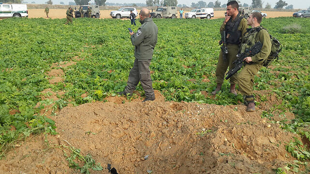 IDF soldiers locate site where rocket fell in Eshkol Regional Council. (Photo: Roee Idan)