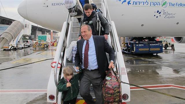 Rabbi Yechiel Eckstein with some of the new immigrants