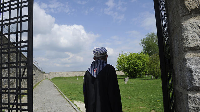 Ceremony commemorating 68 years of the liberation of Mauthausen concentration camp, Austria (Photo credit: AFP) (צילום: AFP) Ceremony commemorating 68 years of the liberation of Mauthausen concentration camp, Austria (Photo credit: AFP)