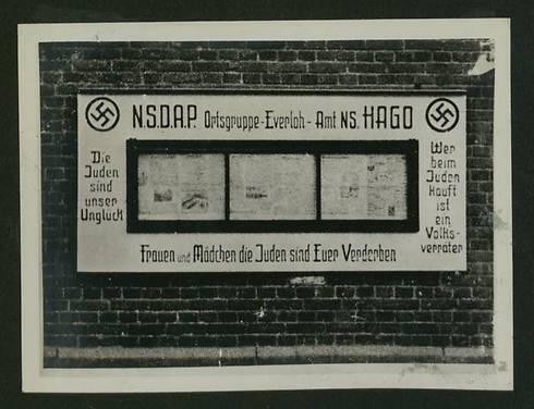 Nazi party signs in a German village: 'Jews are our problem' (Photo courtesy of the National Library)