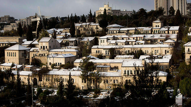 Houses in Jerusalem covered in snow (Photo: EPA)