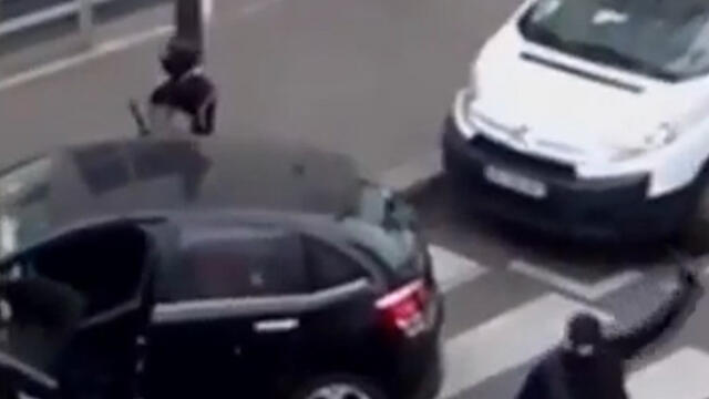 Kouachi brothers fleeing Charlie Hebdonullnull Kouachi brothers fleeing Charlie Hebdo