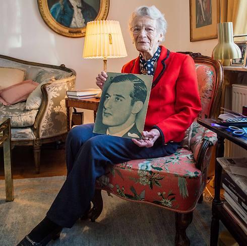 Nina Lagergren holds a picture of her brother at her apartment in Djursholm near Stockholm (Photo: AFP)