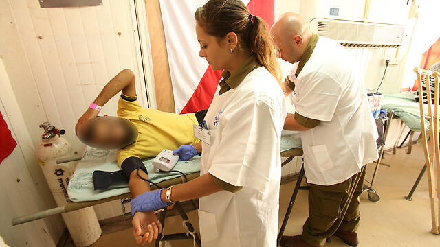 Wounded Syrian receives treatment in Israeli hospital (Archive photo: Elad Gershgoren)