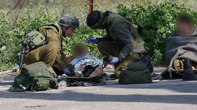 IDF soldier wounded in attack. (Photo: EPA) (צילום: EPA) IDF soldier wounded in attack. (Photo: EPA)