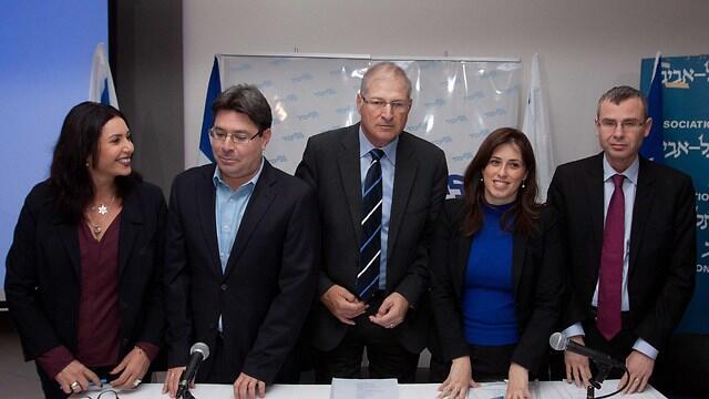 David Shimron, center, joins Likud bigwigs to accuse Zionist Camp of electoral corruption in the run-up to the March 17 vote. (Photo: Ido Erez)
