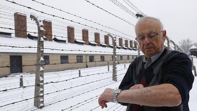 Survivor Jack Rosenthal from the US displays his prisoner number (Photo: Reuters) (Photo: Reuters) Survivor Jack Rosenthal from the US displays his prisoner number (Photo: Reuters)