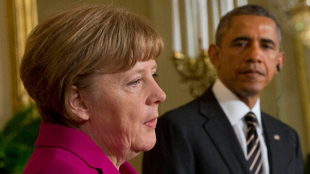 Merkel and Obama (Photo: Associated Press)