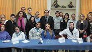 Former education minister Shai Piron meets with members of the Acre Youth Parliament