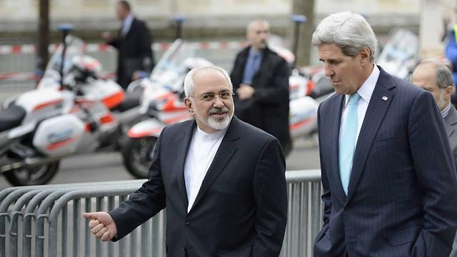 Zarif and Kerry during nuclear talks in Geneva (Photo: AP) (צילום: AP) Zarif and Kerry during nuclear talks in Geneva (Photo: AP)