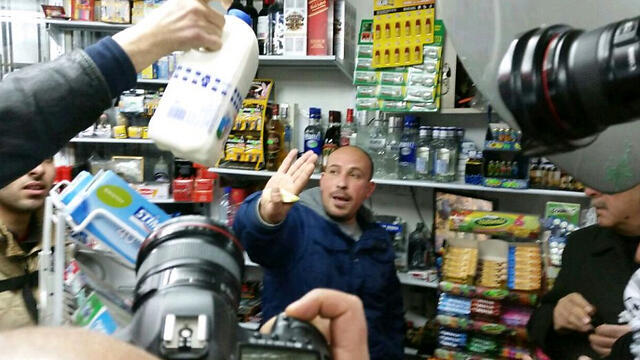 Inspectors find Israeli milk brand being sold at shop despite boycott of Israeli goods. (Photo: Elior Levy) (צילום: אליאור לוי) Inspectors find Israeli milk brand being sold at shop despite boycott of Israeli goods. (Photo: Elior Levy)