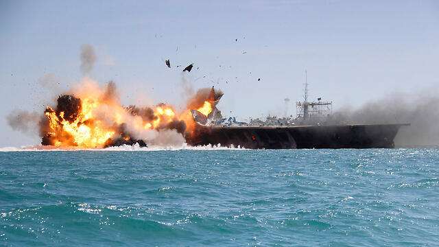 Iran blowing up a replica US warship during a military drill. 'Obama doesn't get it' (Photo: AP) (צילום: AP) Iran blowing up a replica US warship during a military drill. 'Obama doesn't get it' (Photo: AP)