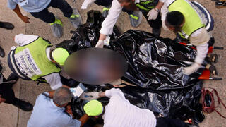 The scene of the bombing at the Hebrew University cafeteria in Jerusalem on July 31, 2002 