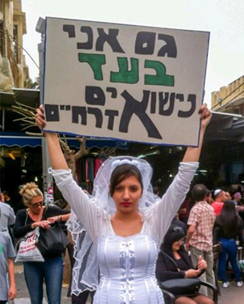 Woman dressed as bride holds sign reading 'I'm also in favor of civil marriage'nullnull Woman dressed as bride holds sign reading 'I'm also in favor of civil marriage'