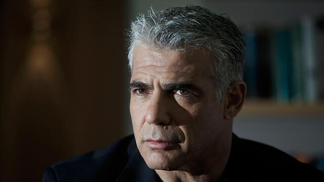 Yair Lapid said his chances of supporting Netanyahu are 'almost slim to zero' (צילום: AP) Yair Lapid said his chances of supporting Netanyahu are 'almost slim to zero'