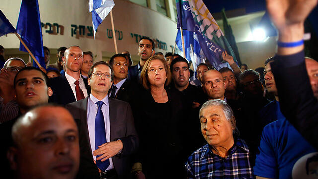 Isaac Herzog and Tzipi Livni on election night (Photo: Reuters)