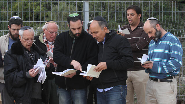 Prayers conducted at ceremony for Adele Biton. (Photo: Ido Erez)