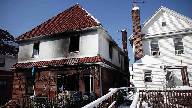 The Sassoon family home in Brooklyn after the fire. (Photo: AFP)