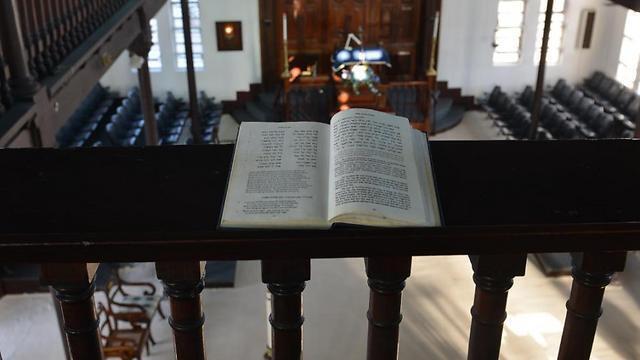 Hebrew prayer book propped on railing of the Shaare Shalom (Photo: AP) (AP) Hebrew prayer book propped on railing of the Shaare Shalom (Photo: AP)