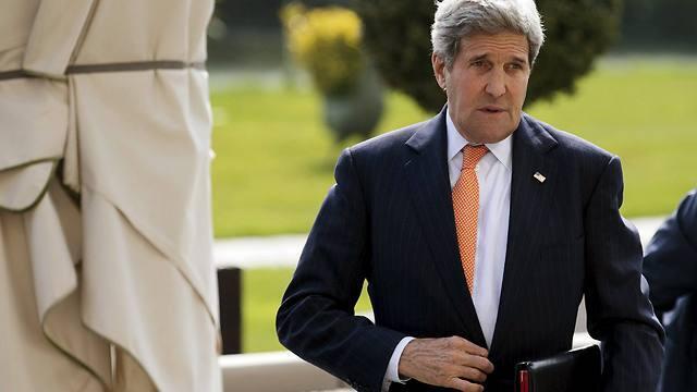 US Secretary of State John Kerry walks back into the hotel after lunch and a morning meeting with Iran's Foreign Minister Mohammad Javad Zarif (Photo: Reuters) (Reuters) US Secretary of State John Kerry walks back into the hotel after lunch and a morning meeting with Iran's Foreign Minister Mohammad Javad Zarif (Photo: Reuters)
