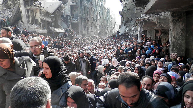 Palestinian refugees in Damascus, Syria, 2014 (Photo: AP)