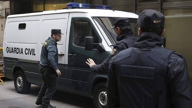 Suspects being brought to court (Photo: EPA) (צילום: EPA) Suspects being brought to court (Photo: EPA)