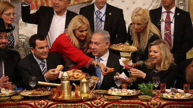 Prime Minister Netanyau and his wife Sara at Mimouna celebrations in Or Akiva (Photo: Elad Gershgoren) (צילום: אלעד גרשגורן "ידיעות אחרונות") Prime Minister Netanyau and his wife Sara at Mimouna celebrations in Or Akiva (Photo: Elad Gershgoren)