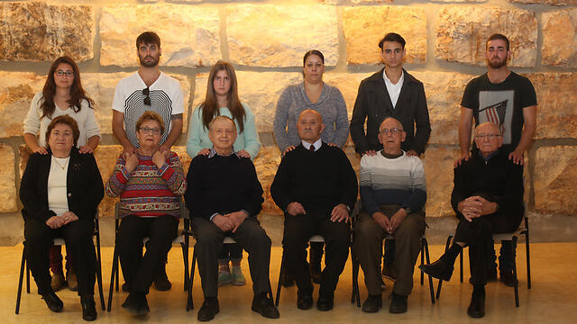 The Holocaust survivors with their grandchildren at rehearsals for the ceremony (Photo: Gil Yohanan)
