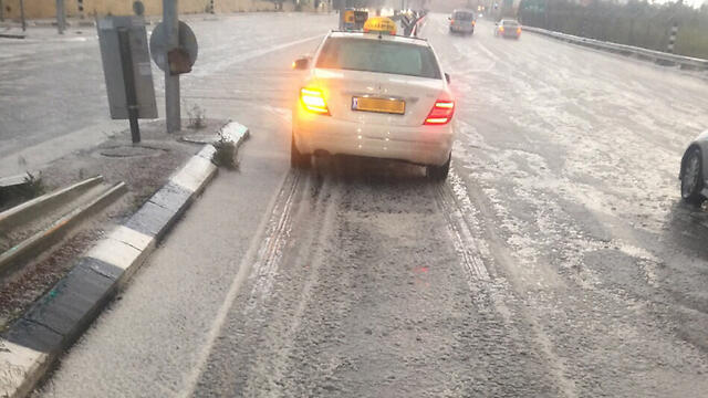 Hail on the road near Mount Herzl.nullnull Hail on the road near Mount Herzl.