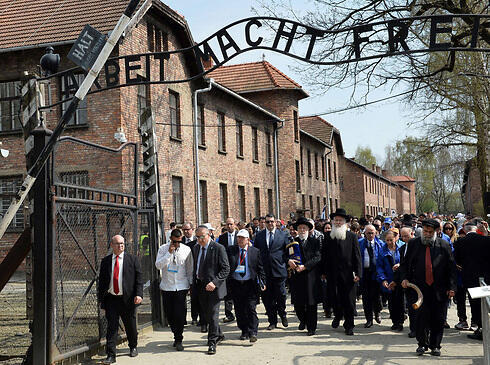 March of the Living at Auschwitz. Growing interest in visits leads to new safety requirements (Photo: AFP) (צילום: AFP) March of the Living at Auschwitz. Growing interest in visits leads to new safety requirements (Photo: AFP)
