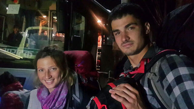 Roei and Dana await the flight home (Photo: Itay Blumenthal)