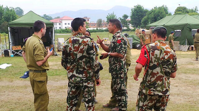 IDF soldiers and Nepalese troops at the makeshift hospital (Photo: Itay Blumenthal)