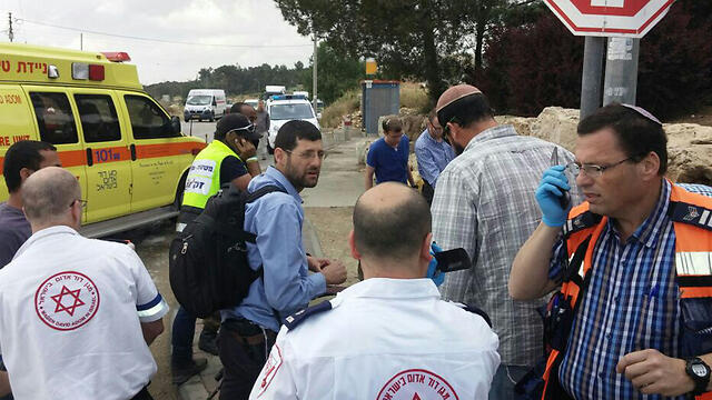 MDA paramedics at scene of car crash (Photo: Gush Etzion Regional Council)