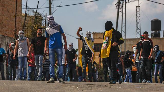 Protestors in Ramallah on Nakba Day (Photo: EPA) (צילום: EPA) Protestors in Ramallah on Nakba Day (Photo: EPA)