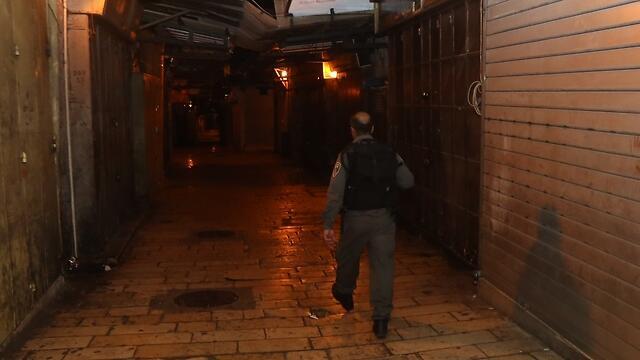 Police in the Old City Saturday night near the scene of the attack. (Photo: Gil Yohanon)