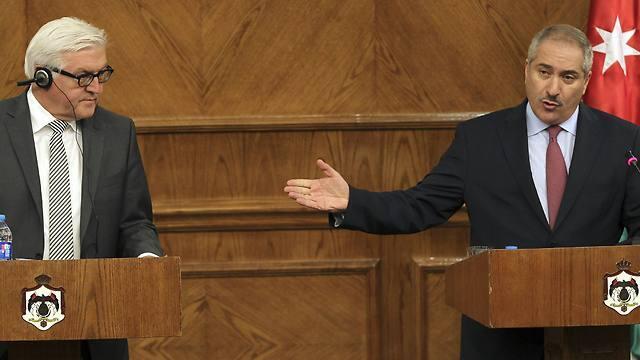 German Foreign Minister Frank-Walter Steinmeier gives a press conference with the Jordanian Foreign Minister Nasser Judeh on Saturday (Photo: AP) (AP) German Foreign Minister Frank-Walter Steinmeier gives a press conference with the Jordanian Foreign Minister Nasser Judeh on Saturday (Photo: AP)