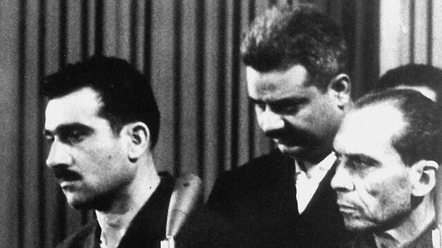 Eli Cohen, left, during his trial in Damascus
