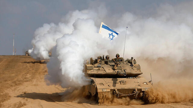 IDF troops leaving the Gaza Strip at the end of the 2014 war (Photo: Reuters) (צילום: רויטרס) IDF troops leaving the Gaza Strip at the end of the 2014 war (Photo: Reuters)