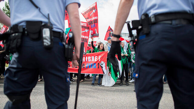 Protesters outside the FIFA Congress meeting. (Photo: EPA)