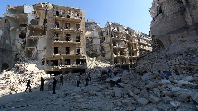 Shells of buildings in Aleppo, Syria (Photo: AFP) (צילום: AFP) Shells of buildings in Aleppo, Syria (Photo: AFP)