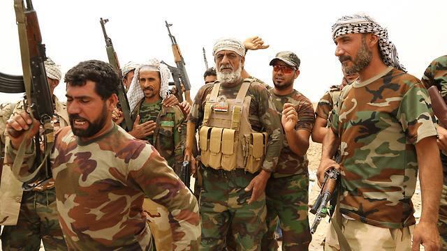 Iraqi shiite fighters (Photo: Iraq) (צילום: AP) Iraqi shiite fighters (Photo: Iraq)