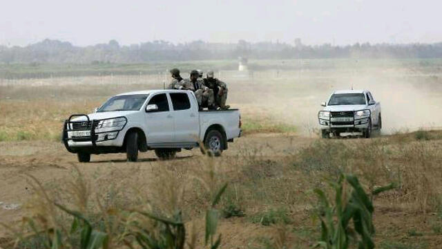 An armed Hamas patrol on the new border road.