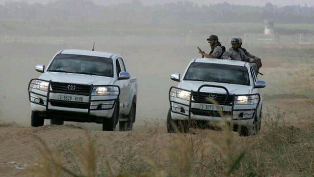 An armed Hamas patrol on the new border road.