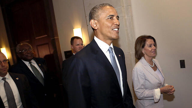 President Obama arriving to urge Congress members such as Nancy Pelosi (R) to back the agreement (Photo: Reuters) 