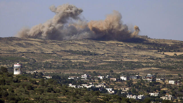 Explosions in Syria seen from Israel (Photo: AFP)